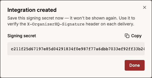 The signing secret is shown once, right after creation